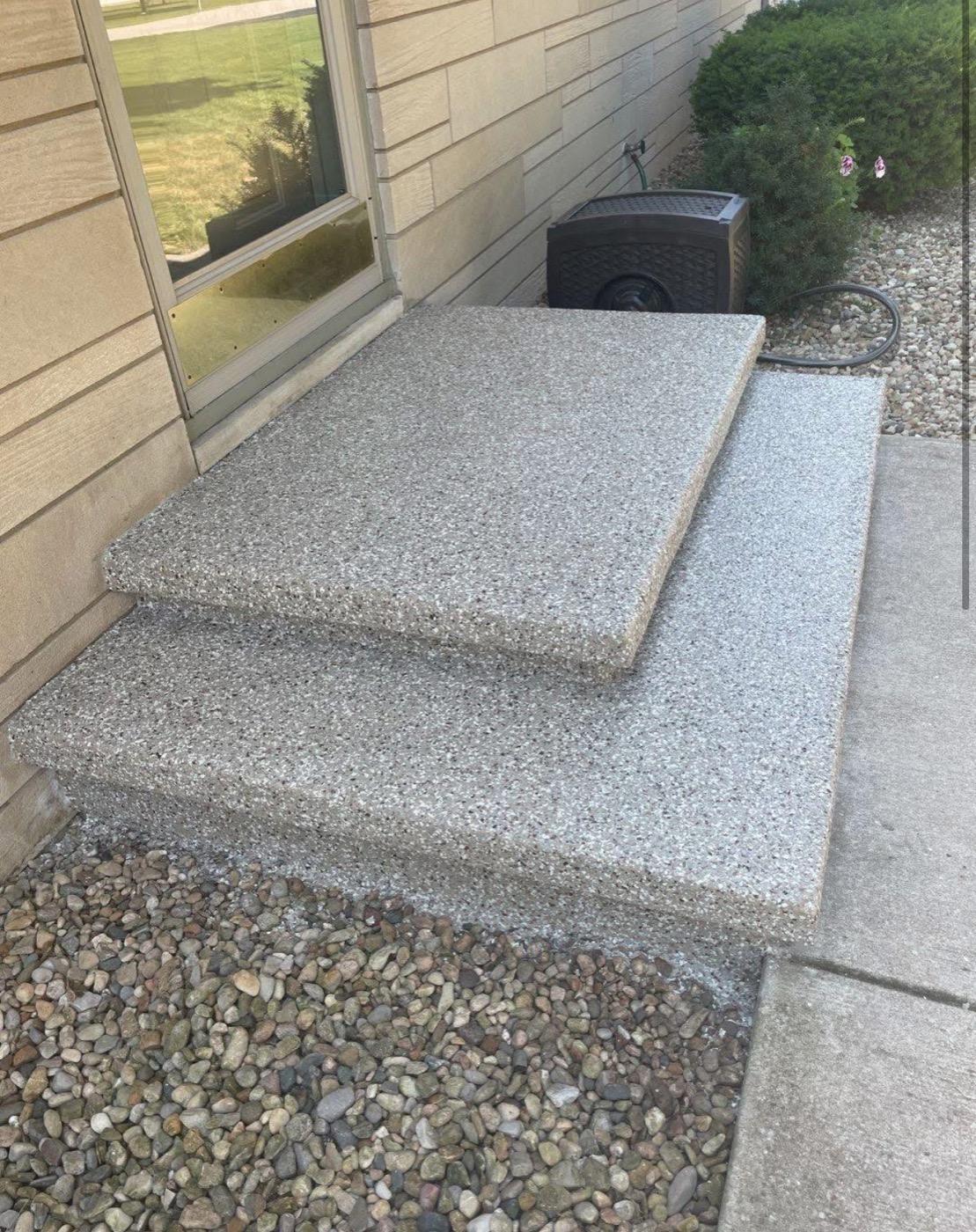 After: flake epoxy coating on outdoor concrete steps