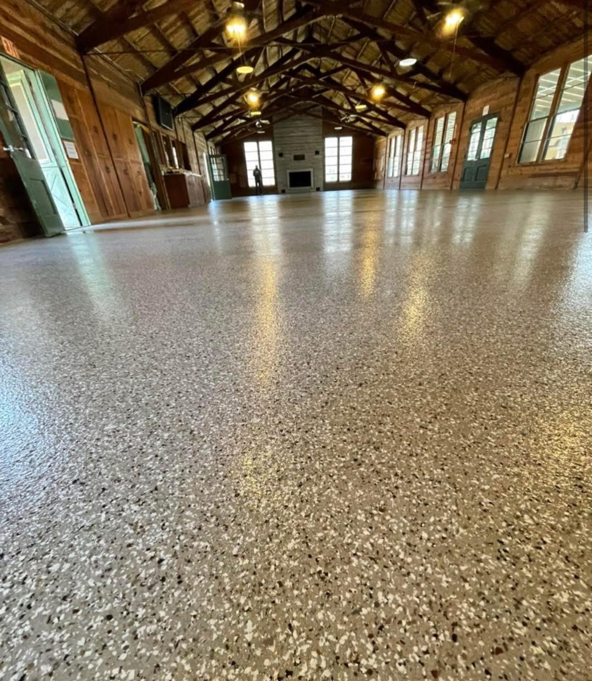 After: flake epoxy concrete coating applied