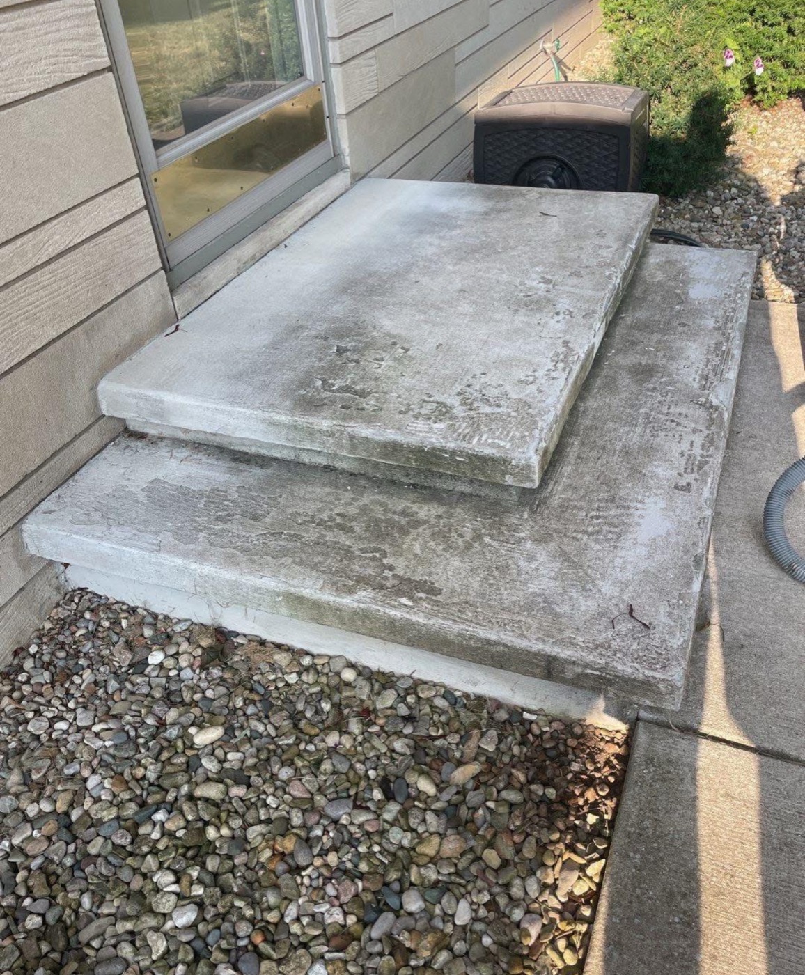 Before: weathered concrete steps with staining and wear